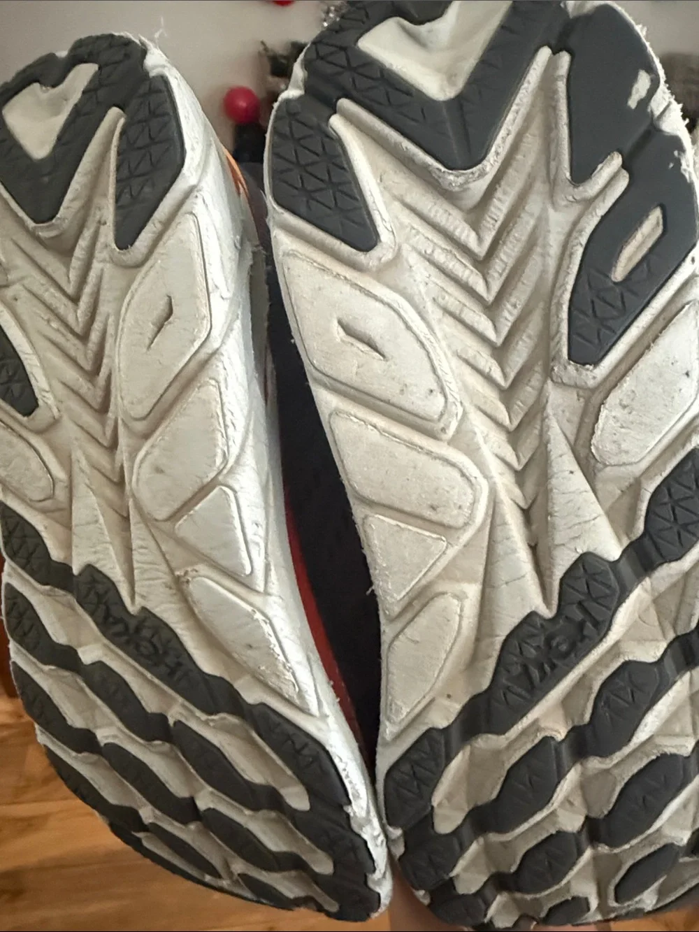 Hoka Men's Gray and Black Running Sneakers with Red and Yellow Accents